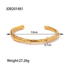 Open cuff bracelet with scattered clear accents