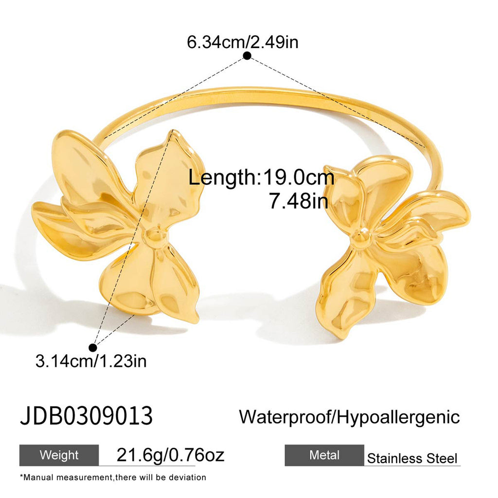 Gold-Tone Stainless Steel Sculptural Floral Jewelry Collection — scale reference