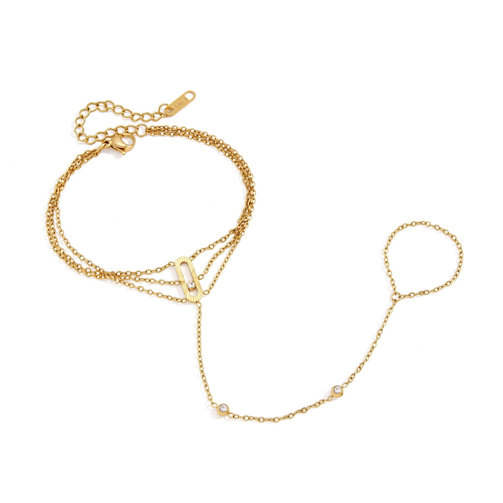 Stainless steel wrist-to-finger chain bracelet on white
