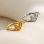 gold plated and silver open heart rings displayed upright