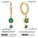Gold tone huggie with green round drops and hinged closure