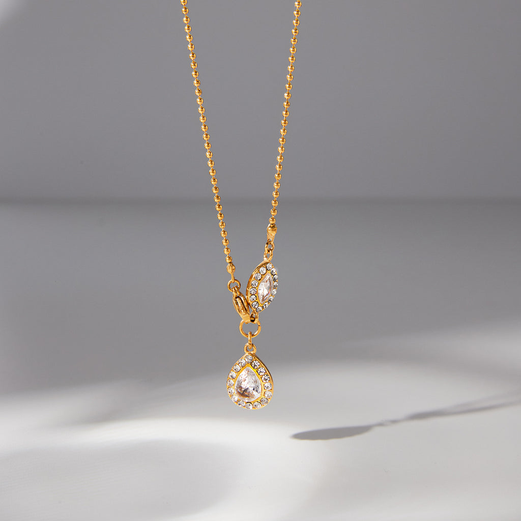 Marquise side accent and pear drop hanging view