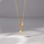 Marquise side accent and pear drop hanging view