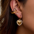 Stainless Steel Heart and Clear Accent Earring Collection – styled view