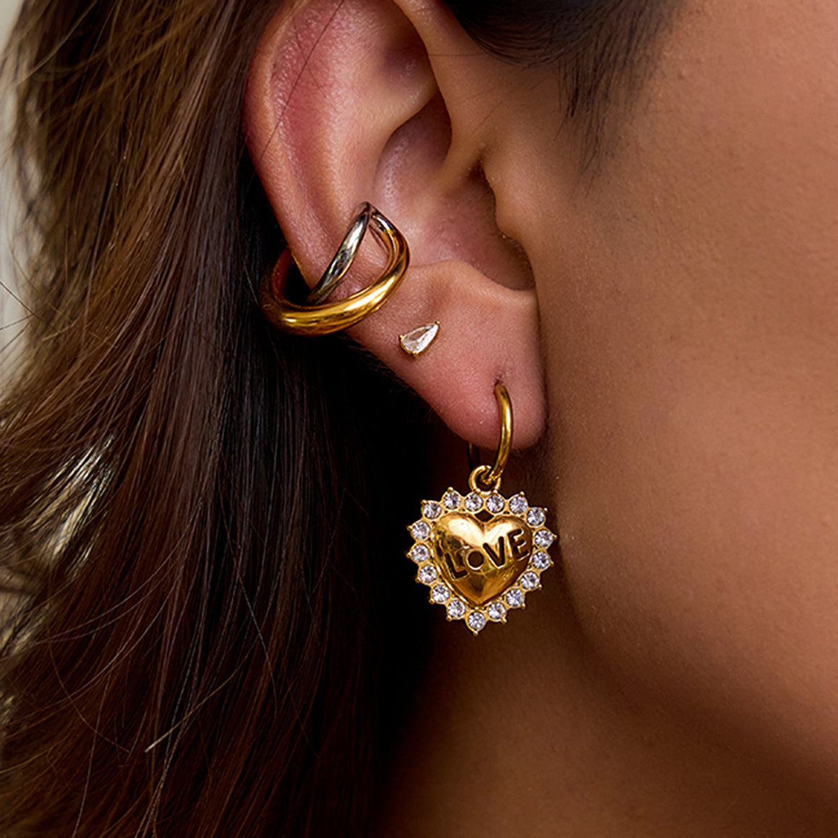 Stainless Steel Heart and Clear Accent Earring Collection – styled view