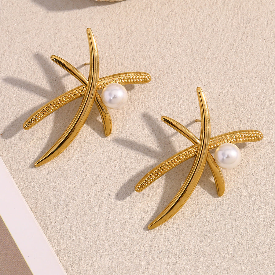 gold plated palm frond stud earrings with white pearl accents