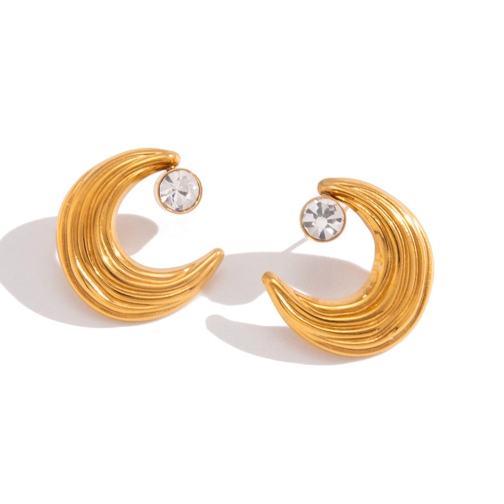 Front product view of ridged crescent studs with round clear stones