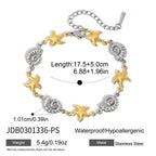 Two-tone starfish and spiral-shell bracelet with extension chain
