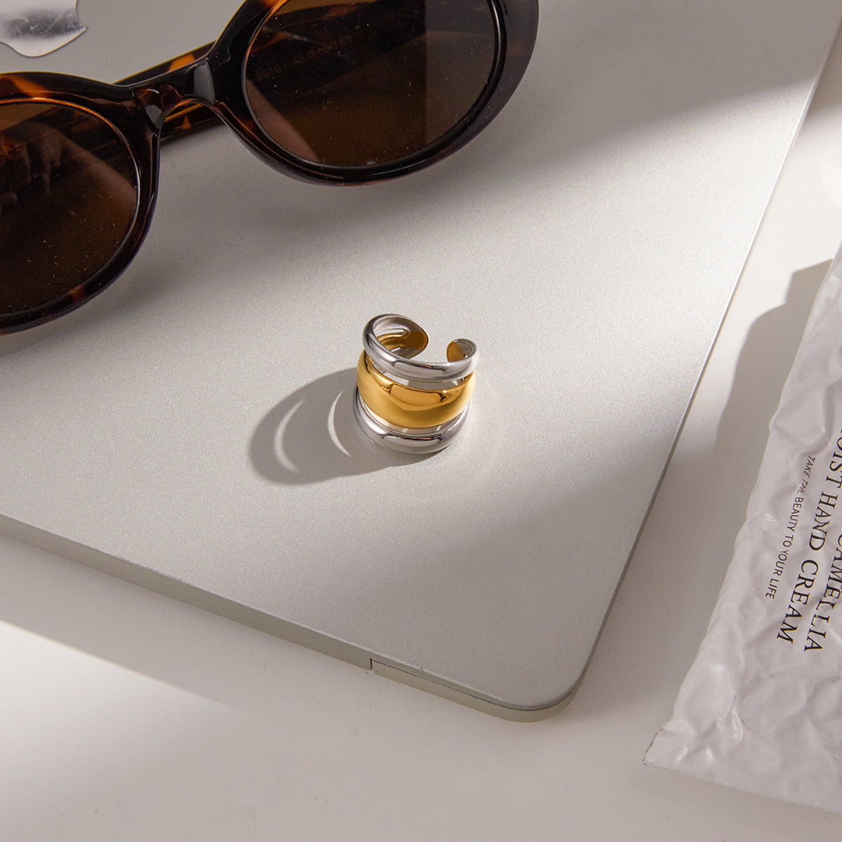 Two-Tone Sculptural Stainless Steel Ring Collection close-up product view