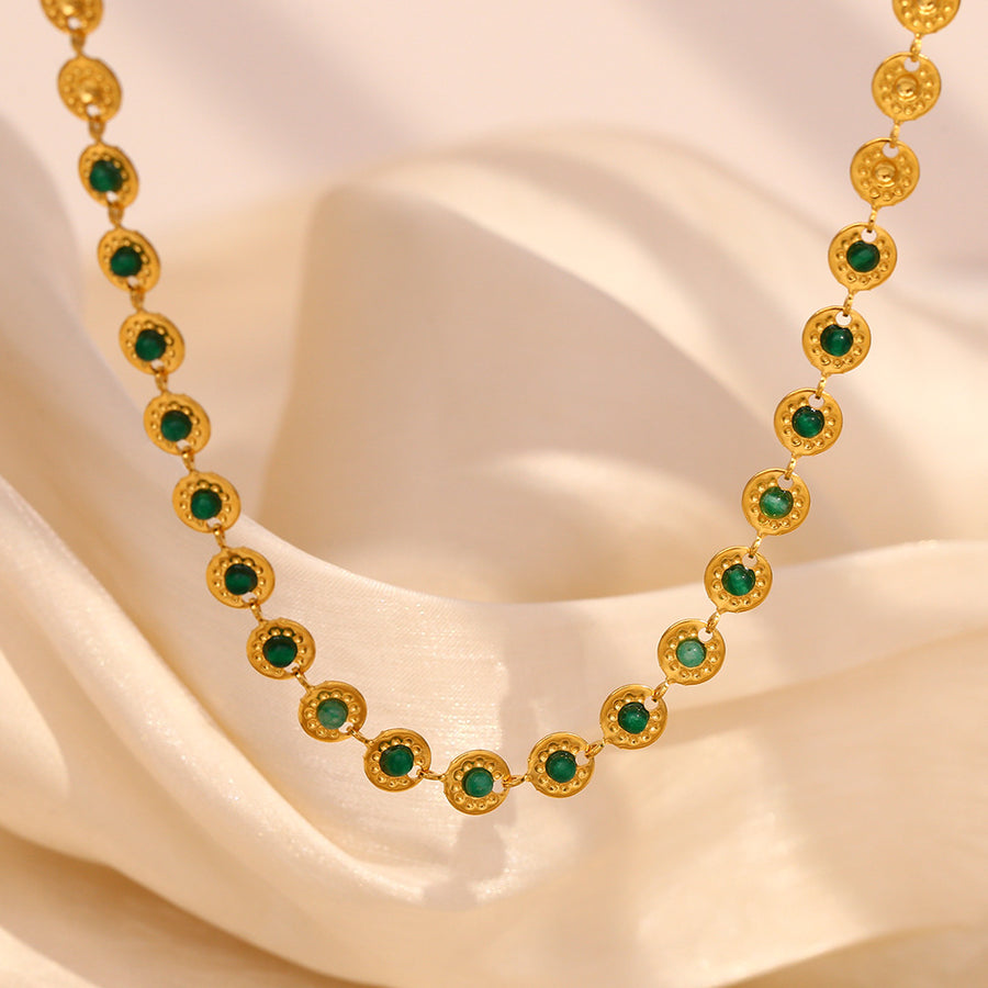 gold plated medallion link necklace with green center stones
