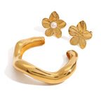 Sculptural Stainless Steel Cuff Bracelet and Flower Rings — styled view of the selectable designs