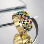 angled wide band ring with red green blue and clear zirconia