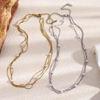 Gold and steel color necklaces showing extension chains