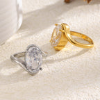 gold plated and silver-finish oval clear-stone bypass rings