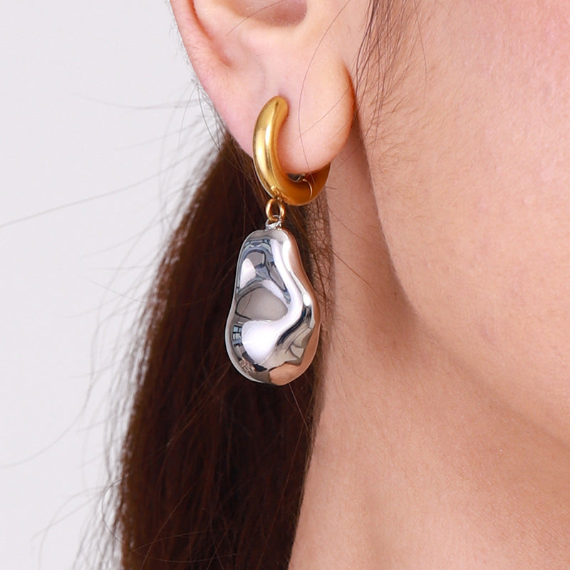 Gold-Tone Stainless Steel Statement Drop Earring Collection — styled view