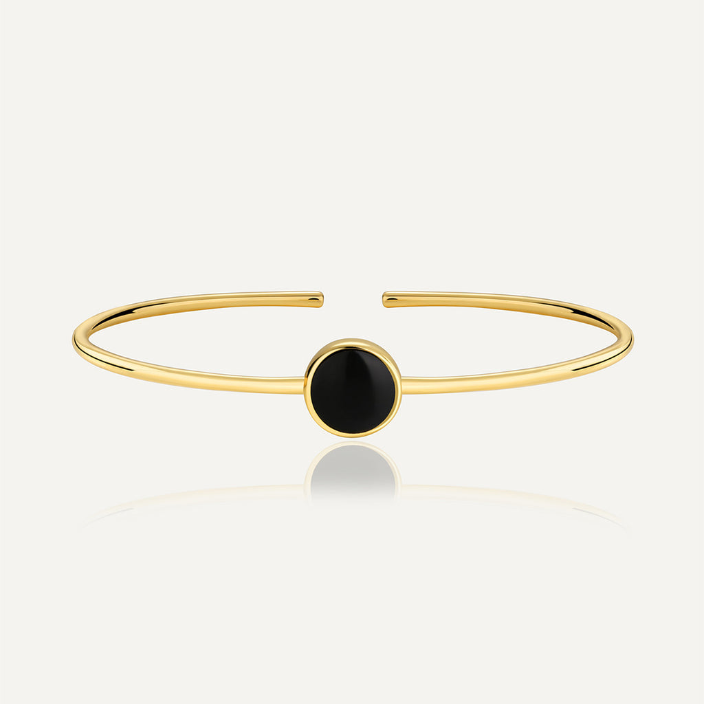 gold plated brass open bangle with round black agate cabochon