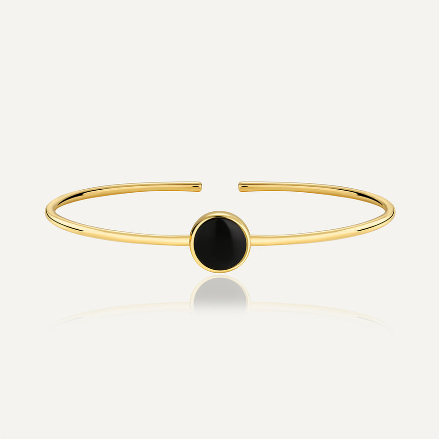 gold plated brass open bangle with round black agate cabochon