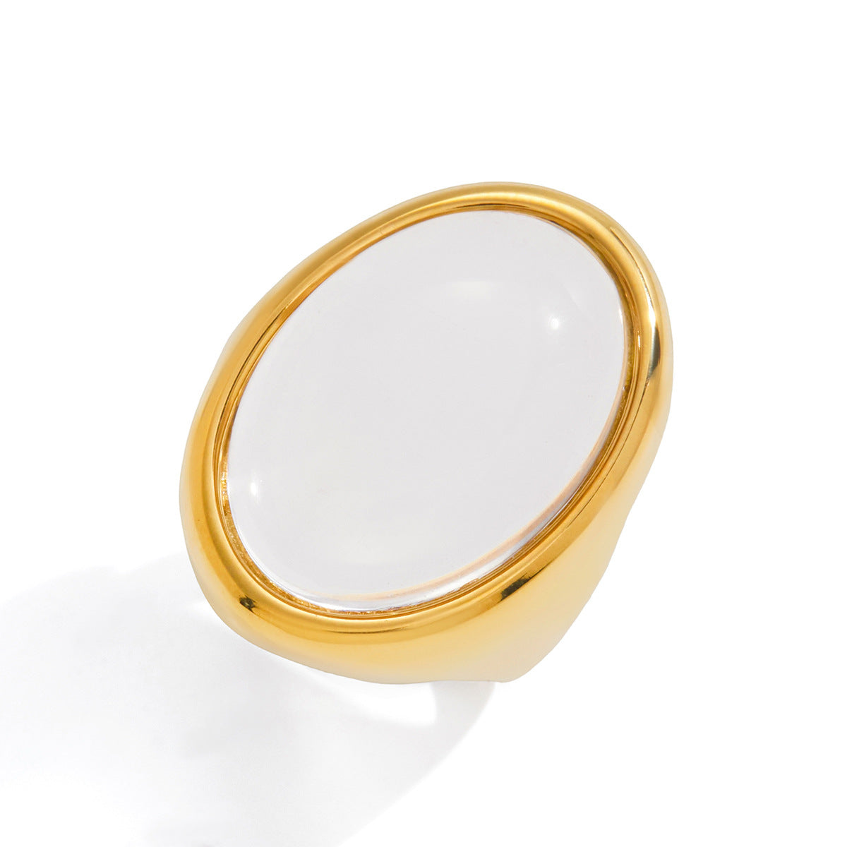 front view of gold plated clear oval cabochon ring