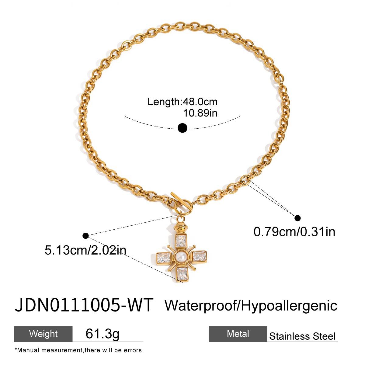 Broad curb-chain necklace with an ornate accent cross and toggle fastening