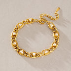 Triangle-accent chain bracelet on stone