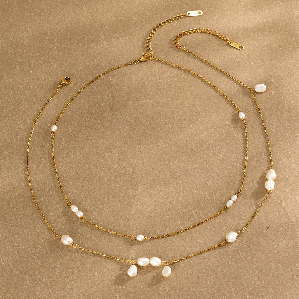 Two white-accent necklace layouts arranged together