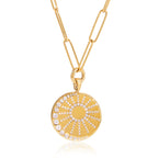 gold plated round sunburst pendant with clear radial stone accents