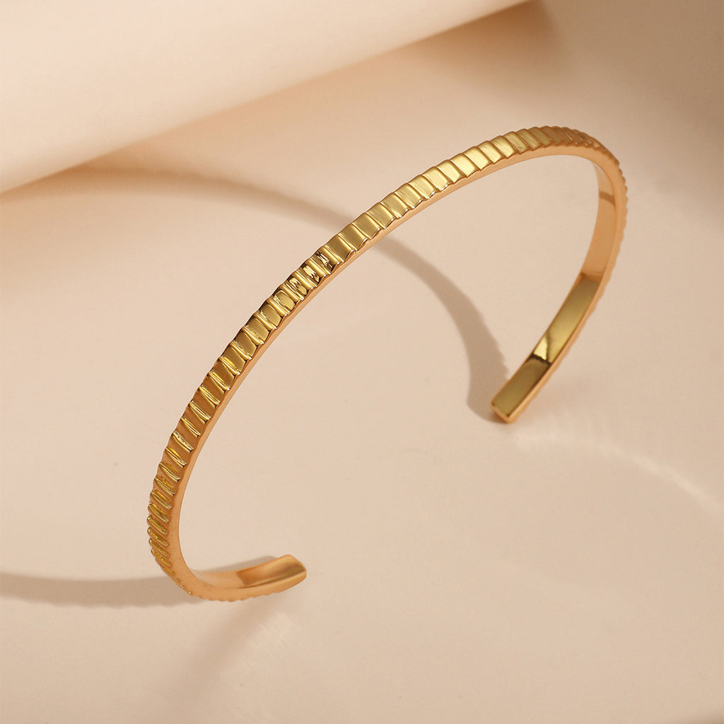 upright profile of the gold plated textured open cuff