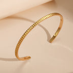 upright profile of the gold plated textured open cuff