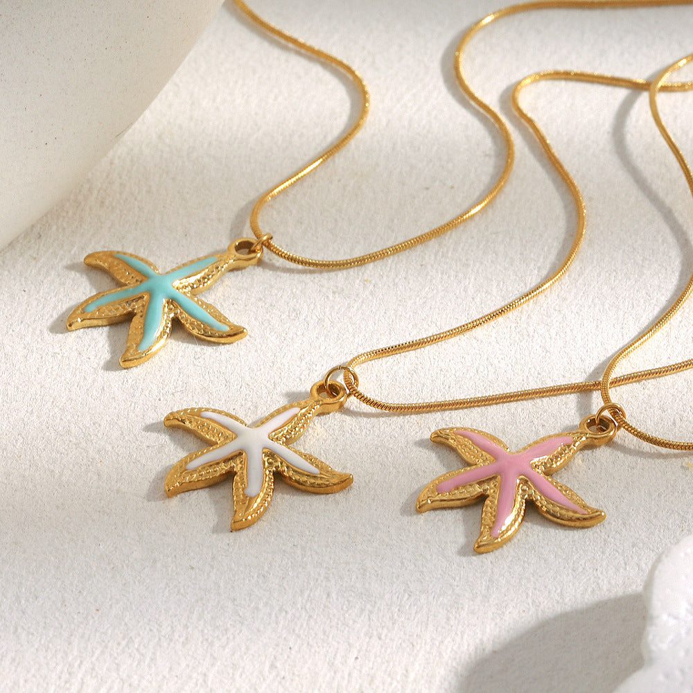 Gold plated starfish necklace color assortment angled view