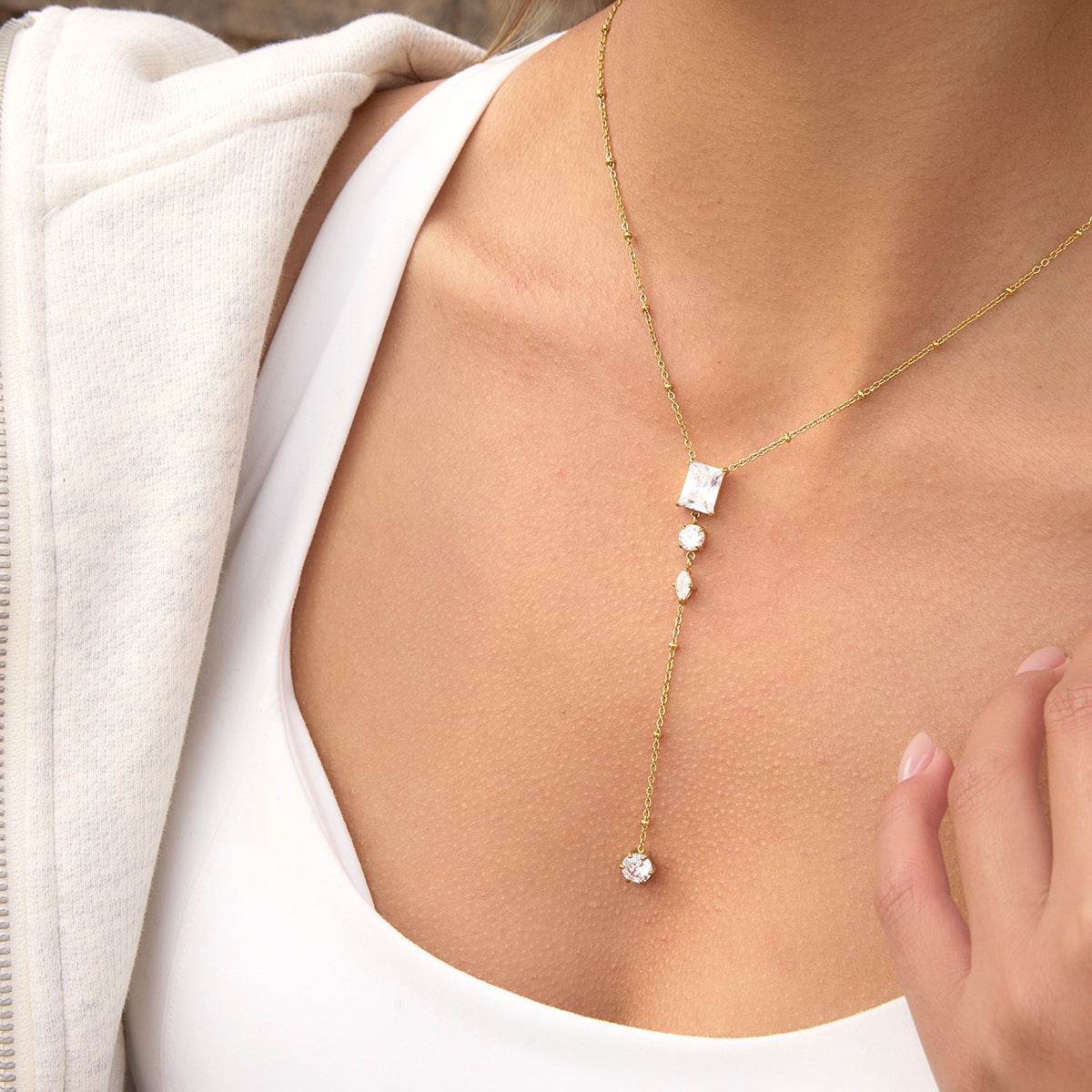 Gold-Tone Clear Stone Stainless Steel Y Necklace Collection — wavy-link Y necklace