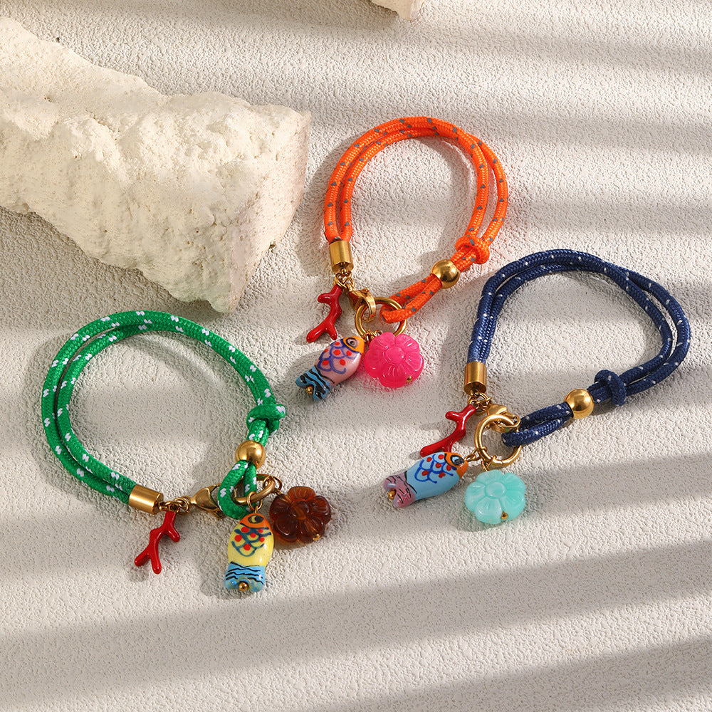 Orange green and navy rope bracelets with fish charms