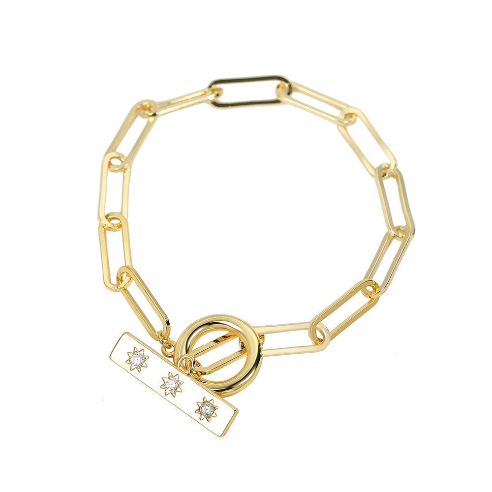 front view of star bar toggle bracelet on white