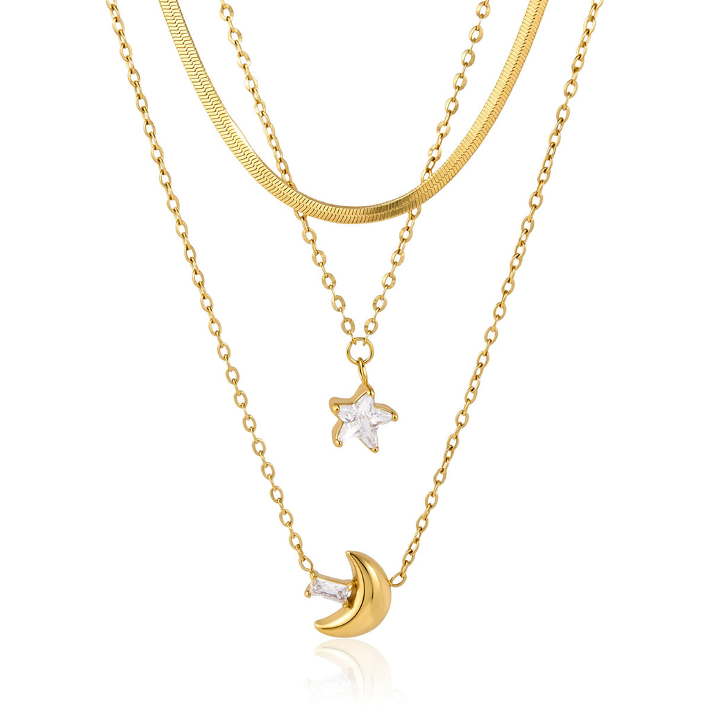 Flat chain star and crescent necklace on white background