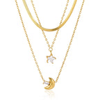 Flat chain star and crescent necklace on white background