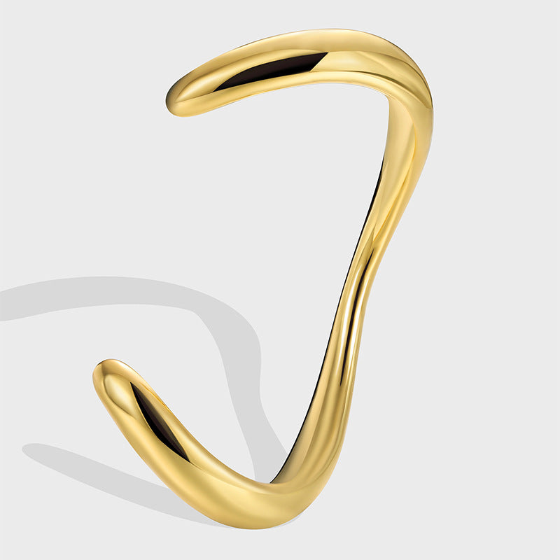 gold plated brass sculptural wave open bangle