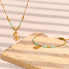 Gold plated aqua bead branch necklace and bracelet styled together