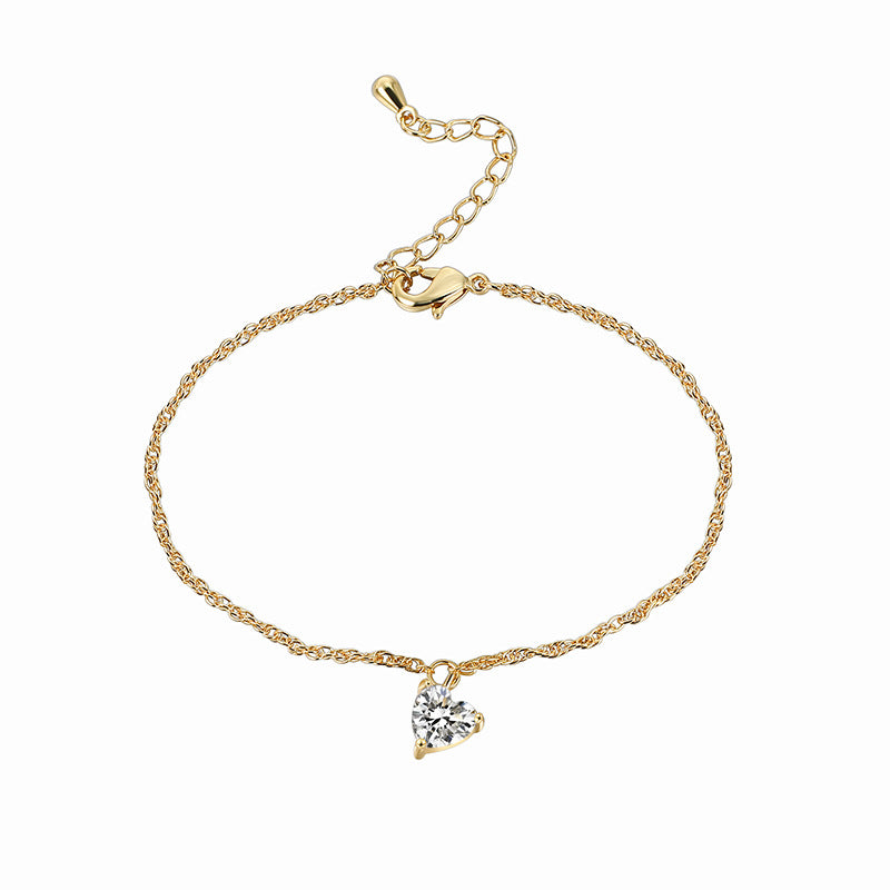 catalog view of fine gold plated bracelet with lobster clasp and heart