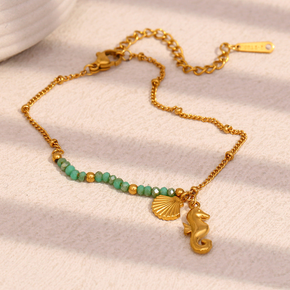 Gold Plated Stainless Steel Green Bead Seahorse and Shell Bracelet — full bracelet view