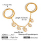 Two rings joined by a chain with clear drops