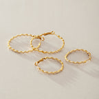 Small and large wavy hoops displayed together