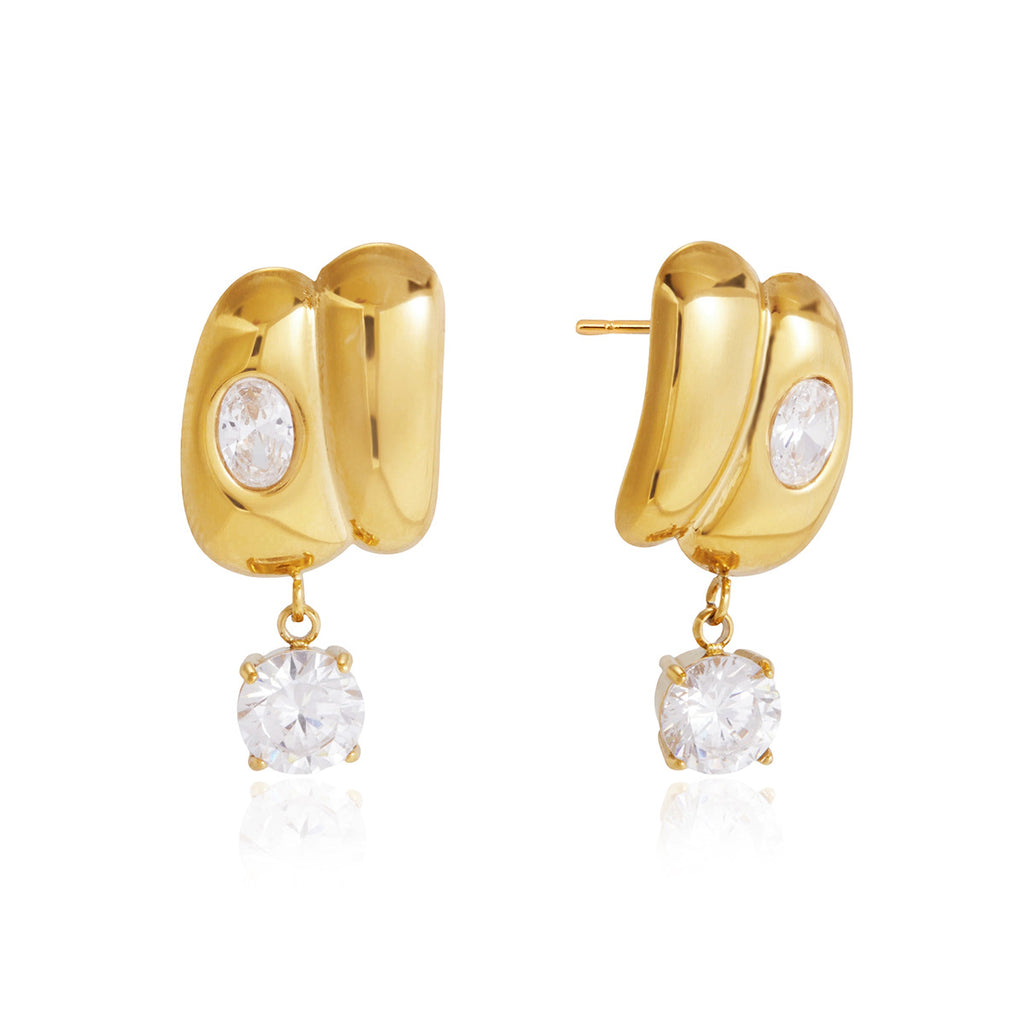 Gold-tone double curved stud earrings on white