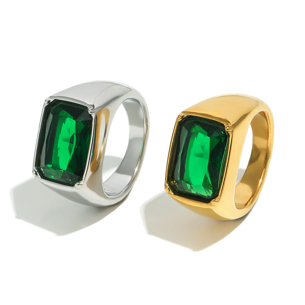 front view of the two green stone signet ring finishes