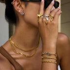 Chain fringe statement rings styled on model