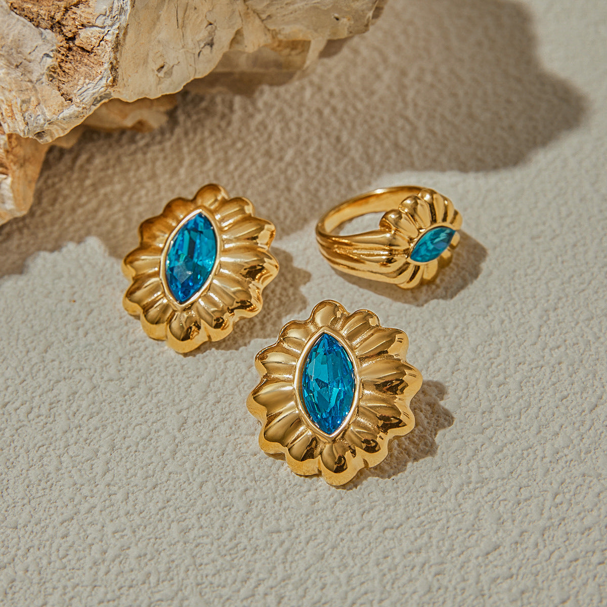 Gold-Tone Blue Zircon Floral Stainless Steel Ring – close-up view