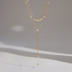 Full Y-shaped necklace displayed against a pale background
