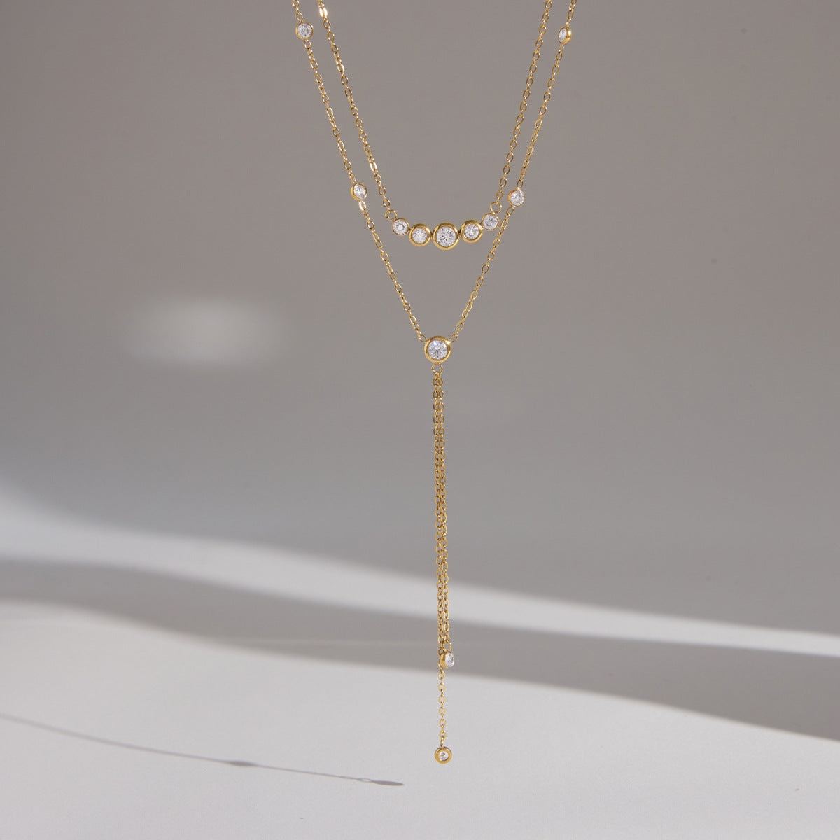Full Y-shaped necklace displayed against a pale background