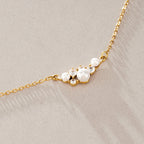 Close-up of the white bead cluster pendant