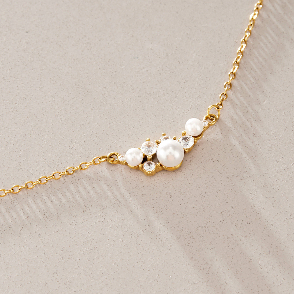 Close-up of the white bead cluster pendant