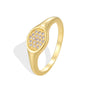 three-quarter cutout of gold plated clear-stone signet ring