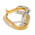 isolated stainless steel open ring with flowing two-tone loops